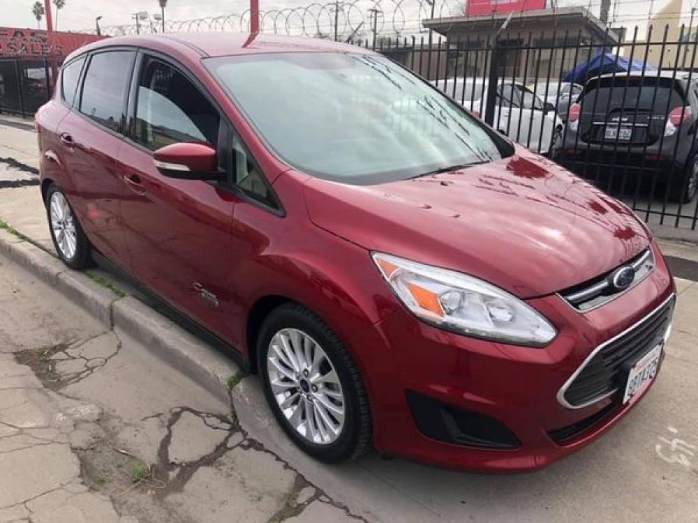 2017 RUBY RED Ford C-Max Energi SE (1FADP5EU9HL) with an 2.0L L4 DOHC 16V HYBRID engine, CVT transmission, located at 744 E Miner Ave, Stockton, CA, 95202, (209) 944-5770, 37.956863, -121.282082 - Photo #0