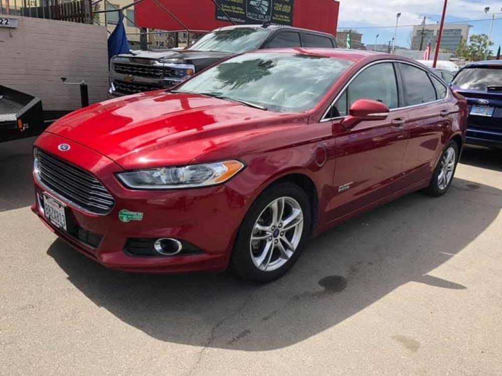 2015 RED Ford Fusion Energi Titanium (3FA6P0SU5FR) with an 2.0L L4 DOHC 16V HYBRID engine, Continuously Variable Transmission transmission, located at 744 E Miner Ave, Stockton, CA, 95202, (209) 944-5770, 37.956863, -121.282082 - Photo #0