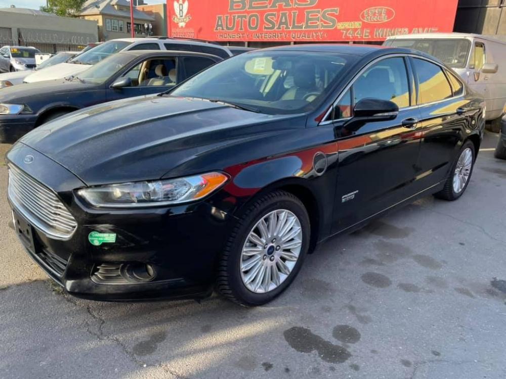 2016 BLACK Ford Fusion Energi SE (3FA6P0PU9GR) with an 2.0L L4 DOHC 16V HYBRID engine, Continuously Variable Transmission transmission, located at 744 E Miner Ave, Stockton, CA, 95202, (209) 944-5770, 37.956863, -121.282082 - Photo #0