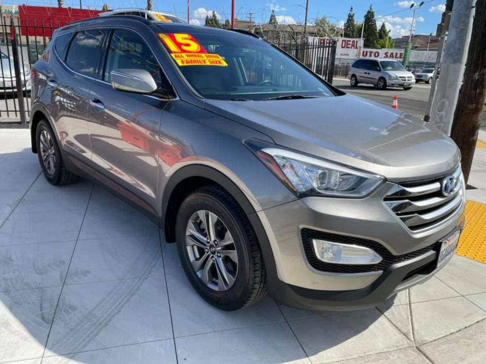 2015 GRAY Hyundai Santa Fe Sport 2.4 AWD (5XYZUDLB0FG) with an 2.4L L4 DOHC 16V engine, 6-Speed Automatic transmission, located at 744 E Miner Ave, Stockton, CA, 95202, (209) 944-5770, 37.956863, -121.282082 - ALL WHEEL DRIVE! PANORAMIC MOONROOF!! LOADED!!! - Photo #0