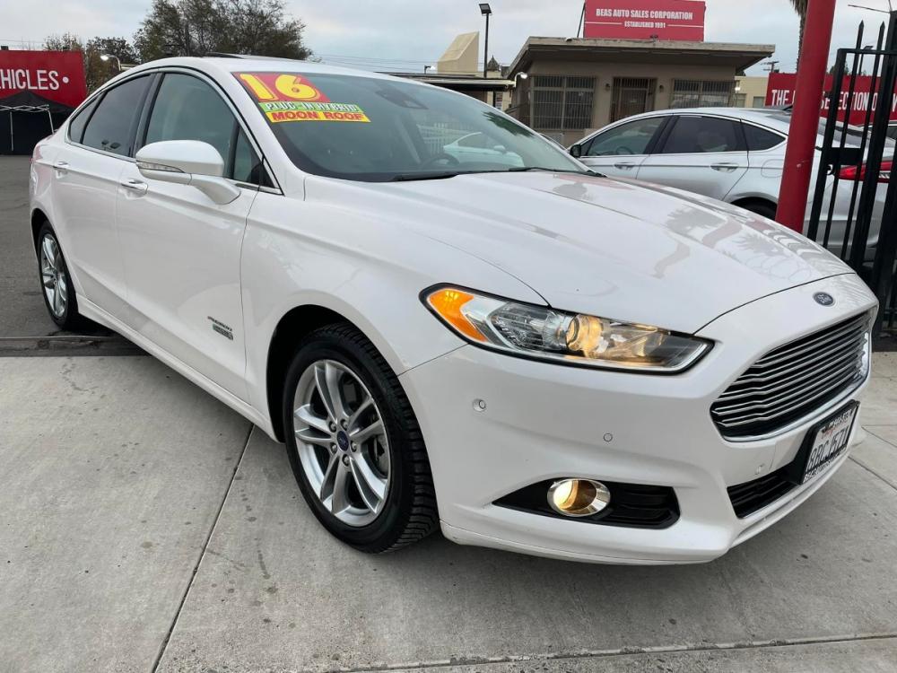 2016 WHITE Ford Fusion Energi Titanium (3FA6P0SUXGR) with an 2.0L L4 DOHC 16V HYBRID engine, Continuously Variable Transmission transmission, located at 744 E Miner Ave, Stockton, CA, 95202, (209) 944-5770, 37.956863, -121.282082 - Photo #0