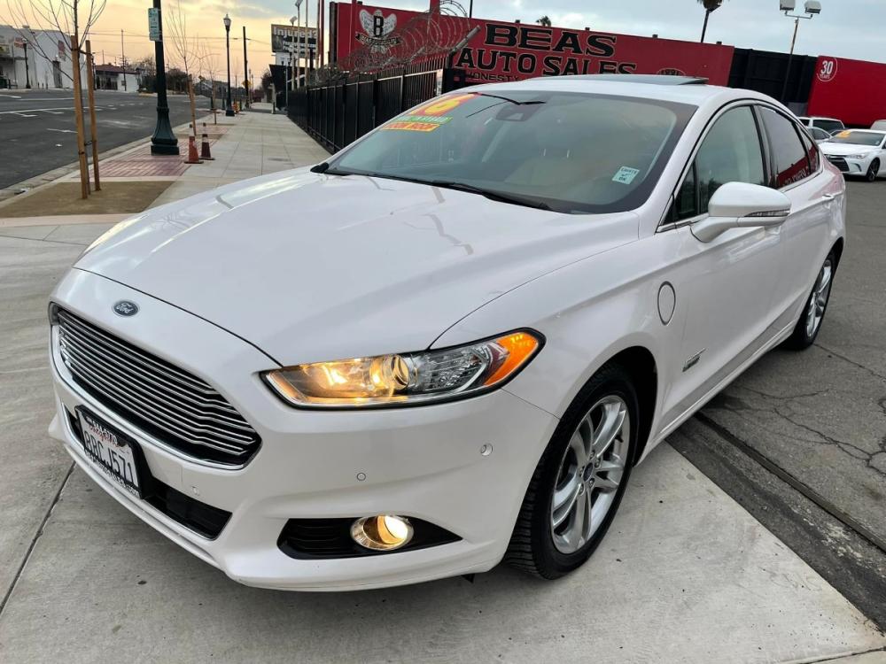 2016 WHITE Ford Fusion Energi Titanium (3FA6P0SUXGR) with an 2.0L L4 DOHC 16V HYBRID engine, Continuously Variable Transmission transmission, located at 744 E Miner Ave, Stockton, CA, 95202, (209) 944-5770, 37.956863, -121.282082 - Photo #3