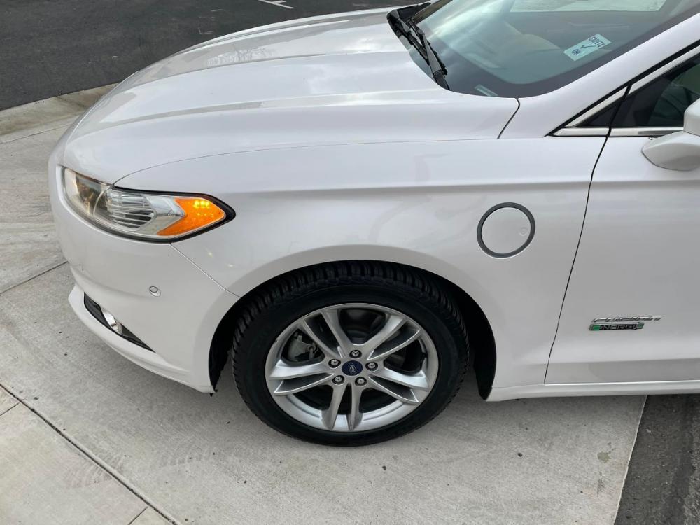 2016 WHITE Ford Fusion Energi Titanium (3FA6P0SUXGR) with an 2.0L L4 DOHC 16V HYBRID engine, Continuously Variable Transmission transmission, located at 744 E Miner Ave, Stockton, CA, 95202, (209) 944-5770, 37.956863, -121.282082 - Photo #4