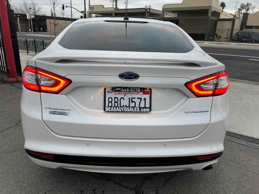 2016 WHITE Ford Fusion Energi Titanium (3FA6P0SUXGR) with an 2.0L L4 DOHC 16V HYBRID engine, Continuously Variable Transmission transmission, located at 744 E Miner Ave, Stockton, CA, 95202, (209) 944-5770, 37.956863, -121.282082 - Photo #6