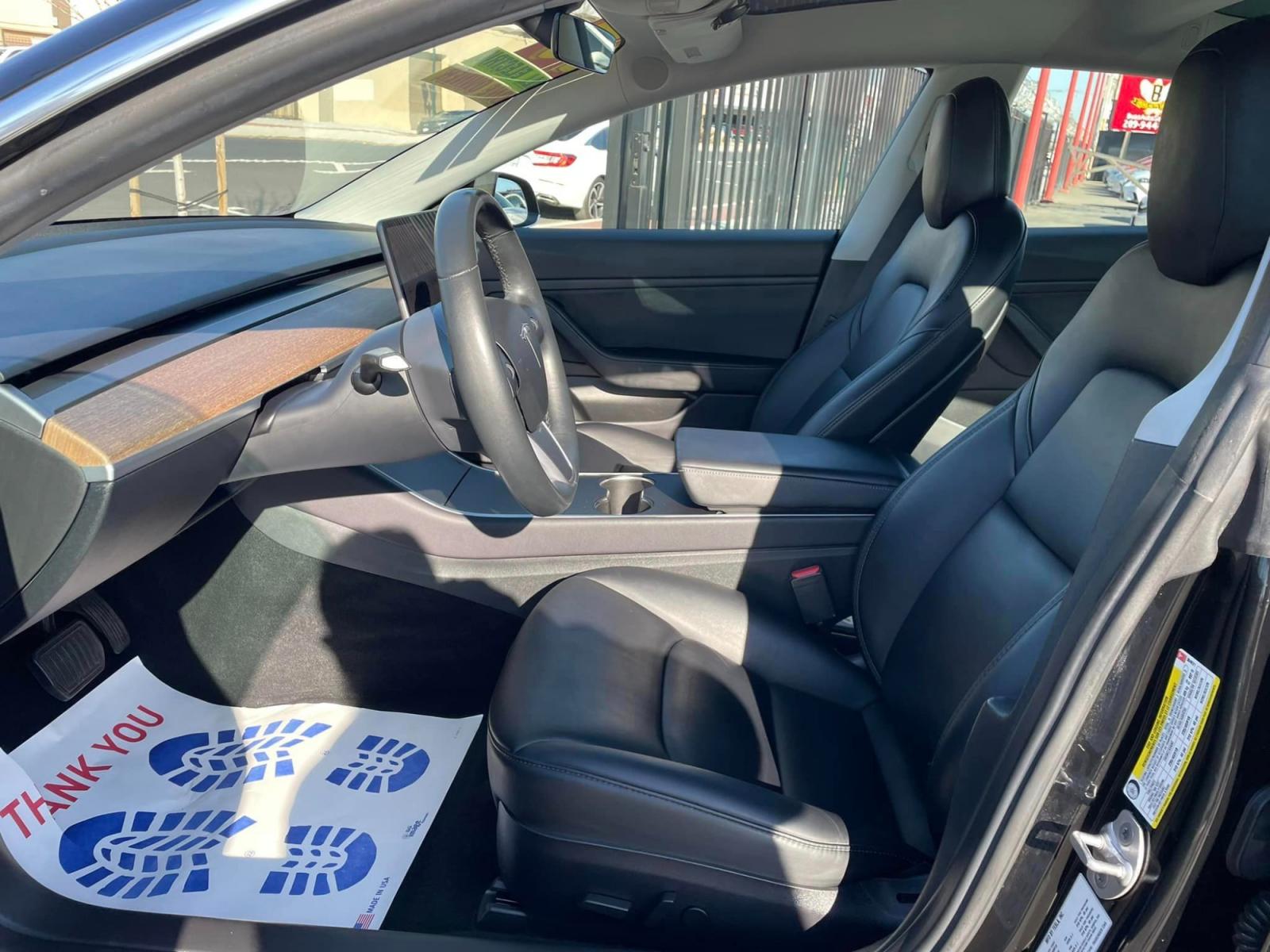 2019 BLACK Tesla Model 3 Standard Plus (5YJ3E1EA2KF) with an ELECTRIC engine, 1A transmission, located at 744 E Miner Ave, Stockton, CA, 95202, (209) 944-5770, 37.956863, -121.282082 - Photo #7