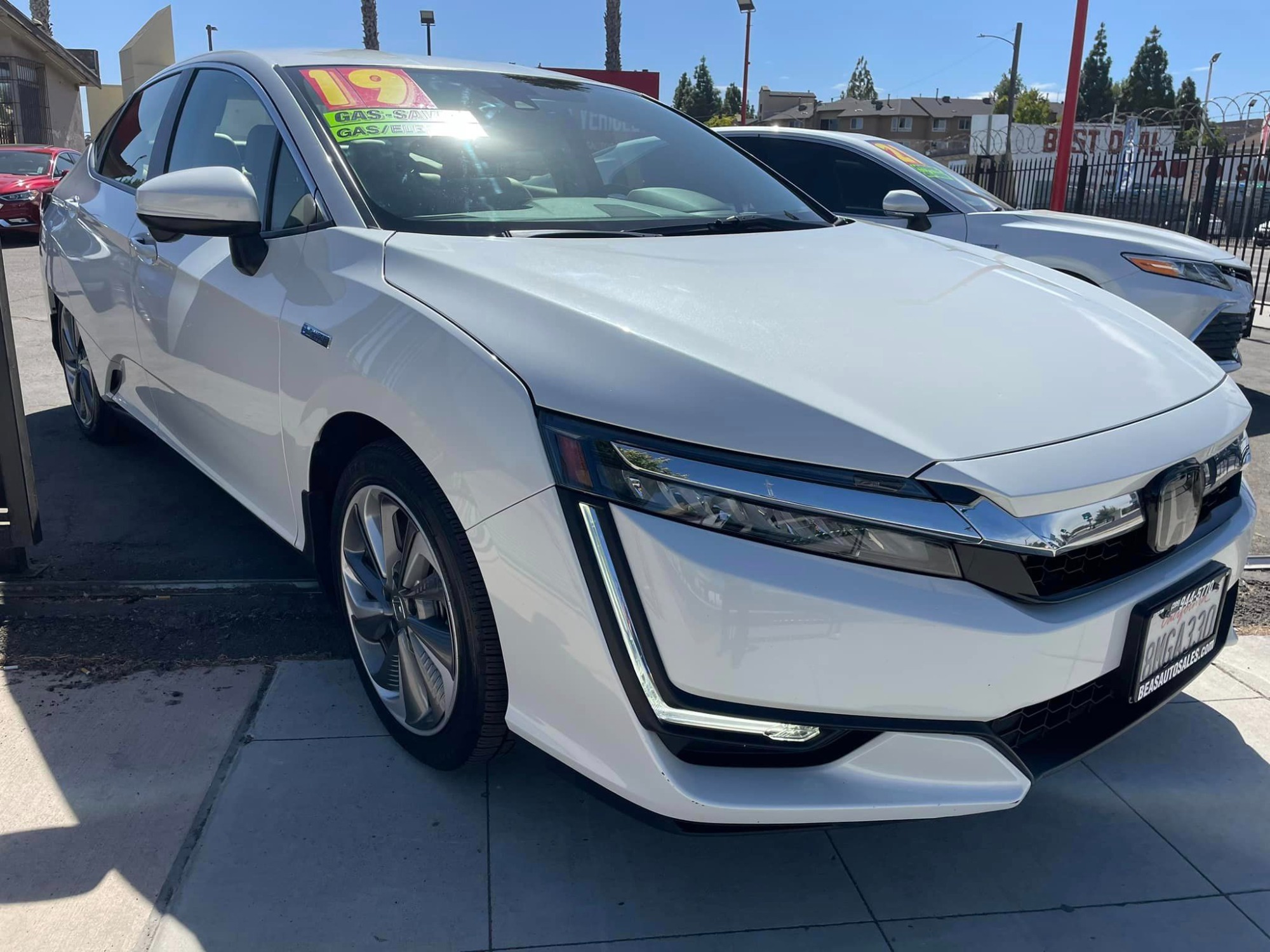 2019 WHITE Honda Clarity Plug-In Hybrid (JHMZC5F19KC) with an 1.5L L4 DOHC 16V HYBRID engine, CVT transmission, located at 744 E Miner Ave, Stockton, CA, 95202, (209) 944-5770, 37.956863, -121.282082 - *PLUS TAXES AND FEES - Photo #0