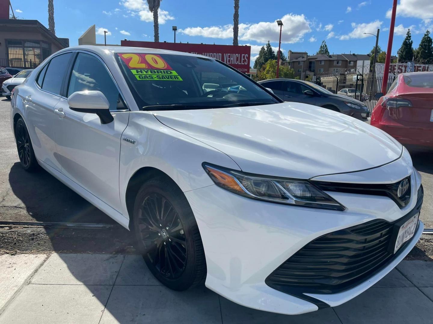 2020 WHITE /BLACK Toyota Camry Hybrid LE (4T1C31AK9LU) with an 2.5L L4 DOHC 16V HYBRID engine, CVT transmission, located at 744 E Miner Ave, Stockton, CA, 95202, (209) 944-5770, 37.956863, -121.282082 - Photo#0