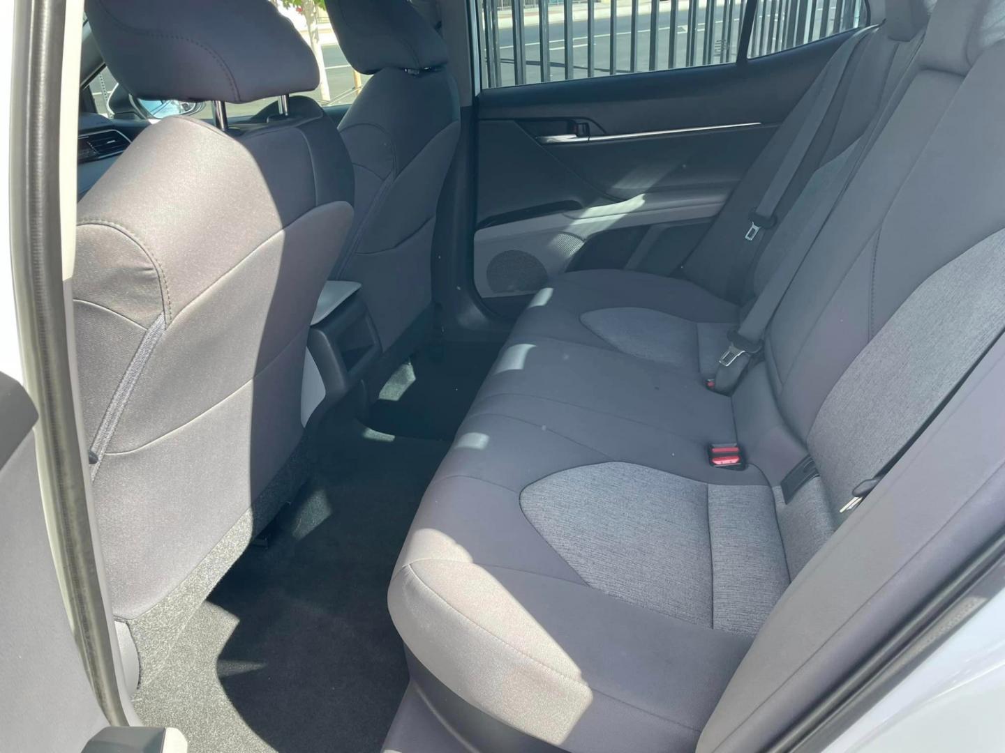 2020 WHITE /BLACK Toyota Camry Hybrid LE (4T1C31AK9LU) with an 2.5L L4 DOHC 16V HYBRID engine, CVT transmission, located at 744 E Miner Ave, Stockton, CA, 95202, (209) 944-5770, 37.956863, -121.282082 - Photo#9