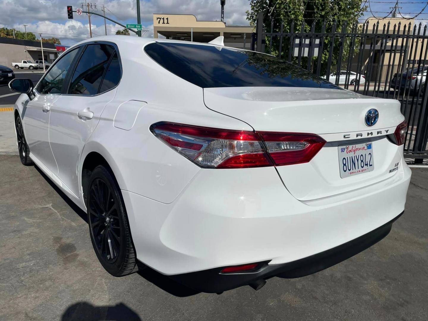 2020 WHITE /BLACK Toyota Camry Hybrid LE (4T1C31AK9LU) with an 2.5L L4 DOHC 16V HYBRID engine, CVT transmission, located at 744 E Miner Ave, Stockton, CA, 95202, (209) 944-5770, 37.956863, -121.282082 - Photo#11