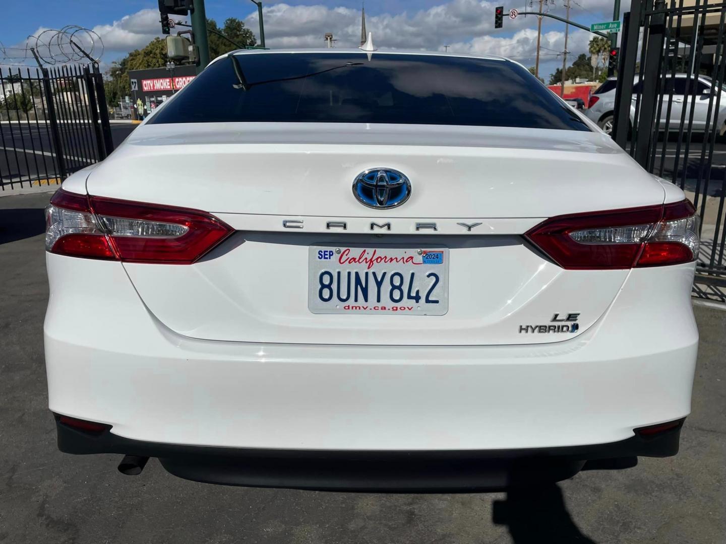 2020 WHITE /BLACK Toyota Camry Hybrid LE (4T1C31AK9LU) with an 2.5L L4 DOHC 16V HYBRID engine, CVT transmission, located at 744 E Miner Ave, Stockton, CA, 95202, (209) 944-5770, 37.956863, -121.282082 - Photo#12
