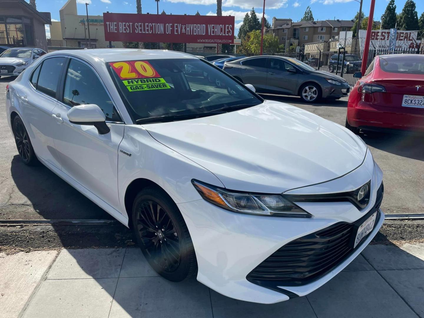 2020 WHITE /BLACK Toyota Camry Hybrid LE (4T1C31AK9LU) with an 2.5L L4 DOHC 16V HYBRID engine, CVT transmission, located at 744 E Miner Ave, Stockton, CA, 95202, (209) 944-5770, 37.956863, -121.282082 - Photo#1