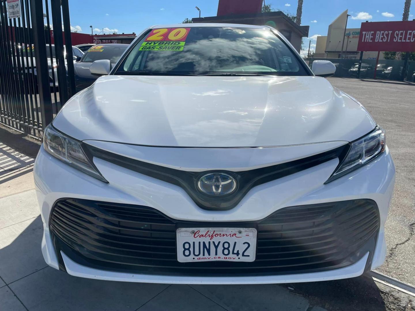 2020 WHITE /BLACK Toyota Camry Hybrid LE (4T1C31AK9LU) with an 2.5L L4 DOHC 16V HYBRID engine, CVT transmission, located at 744 E Miner Ave, Stockton, CA, 95202, (209) 944-5770, 37.956863, -121.282082 - Photo#2
