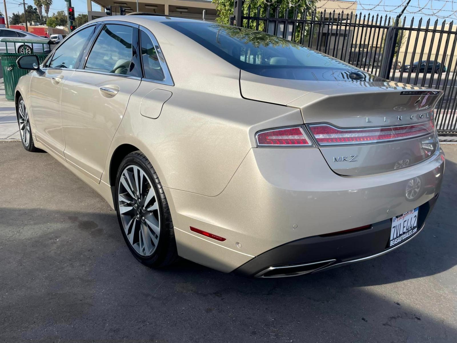 2017 White Gold /White Gold Lincoln MKZ Hybrid Reserve (3LN6L5MUXHR) with an 2.0L L4 DOHC 16V HYBRID engine, CVT transmission, located at 744 E Miner Ave, Stockton, CA, 95202, (209) 944-5770, 37.956863, -121.282082 - Photo #10