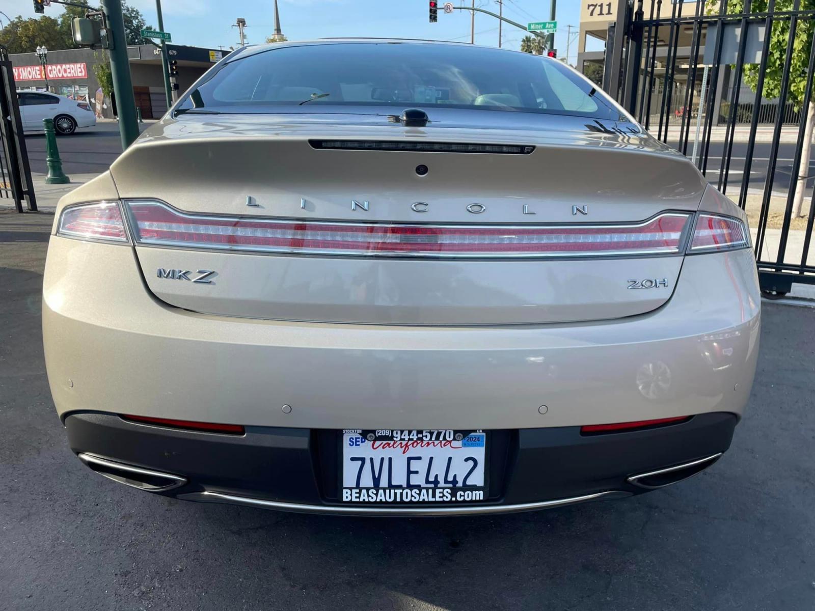 2017 White Gold /White Gold Lincoln MKZ Hybrid Reserve (3LN6L5MUXHR) with an 2.0L L4 DOHC 16V HYBRID engine, CVT transmission, located at 744 E Miner Ave, Stockton, CA, 95202, (209) 944-5770, 37.956863, -121.282082 - Photo #11