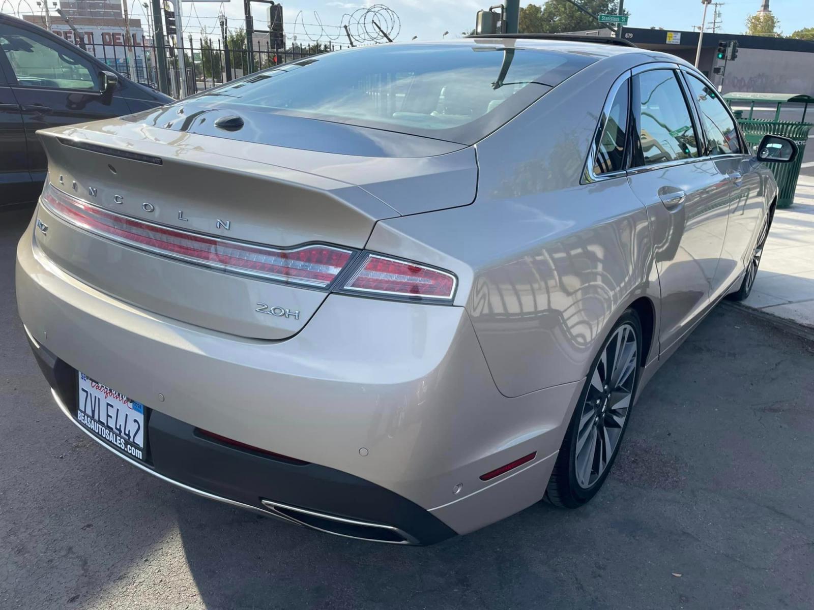 2017 White Gold /White Gold Lincoln MKZ Hybrid Reserve (3LN6L5MUXHR) with an 2.0L L4 DOHC 16V HYBRID engine, CVT transmission, located at 744 E Miner Ave, Stockton, CA, 95202, (209) 944-5770, 37.956863, -121.282082 - Photo #12