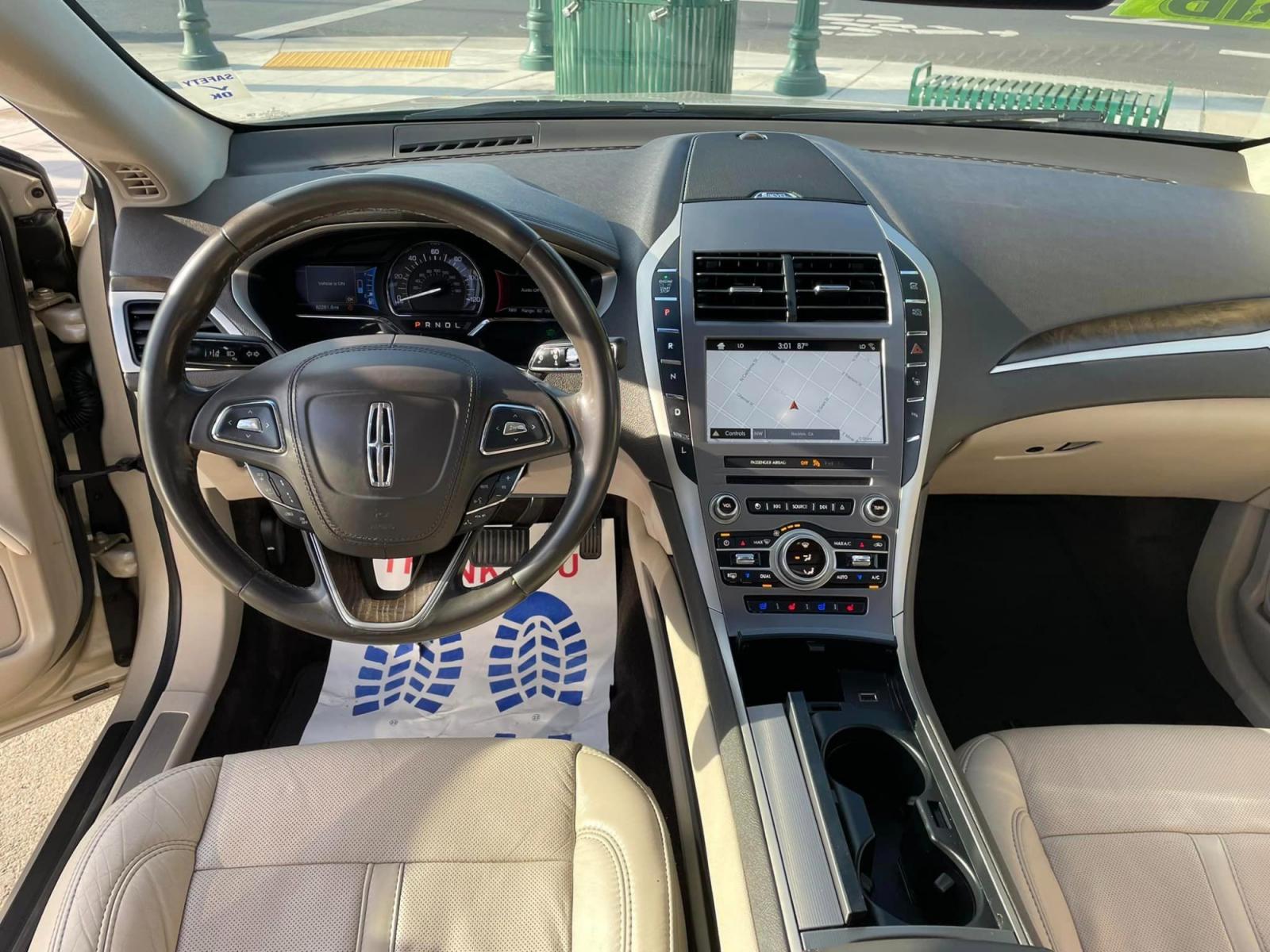 2017 White Gold /White Gold Lincoln MKZ Hybrid Reserve (3LN6L5MUXHR) with an 2.0L L4 DOHC 16V HYBRID engine, CVT transmission, located at 744 E Miner Ave, Stockton, CA, 95202, (209) 944-5770, 37.956863, -121.282082 - Photo #7