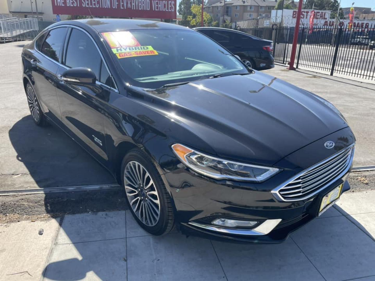 2018 BLACK /BLACK Ford Fusion Energi Titanium (3FA6P0SU1JR) with an 2.0L L4 DOHC 16V HYBRID engine, CVT transmission, located at 744 E Miner Ave, Stockton, CA, 95202, (209) 944-5770, 37.956863, -121.282082 - Photo#1