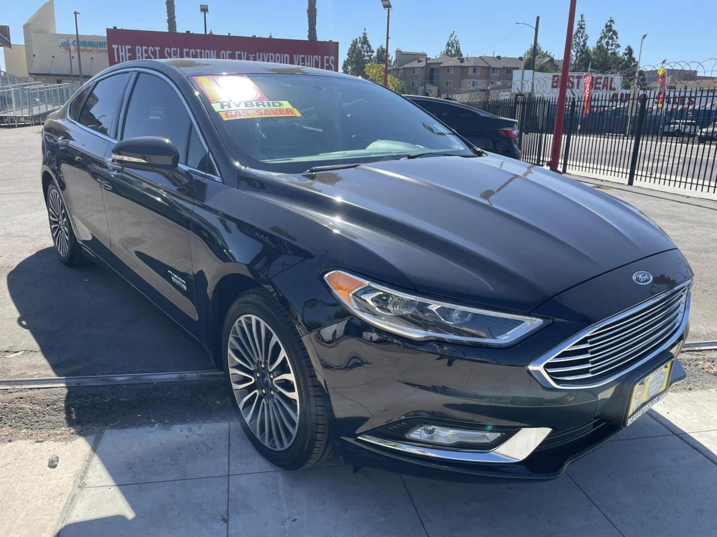 2018 BLACK /BLACK Ford Fusion Energi Titanium (3FA6P0SU1JR) with an 2.0L L4 DOHC 16V HYBRID engine, CVT transmission, located at 744 E Miner Ave, Stockton, CA, 95202, (209) 944-5770, 37.956863, -121.282082 - Photo#0