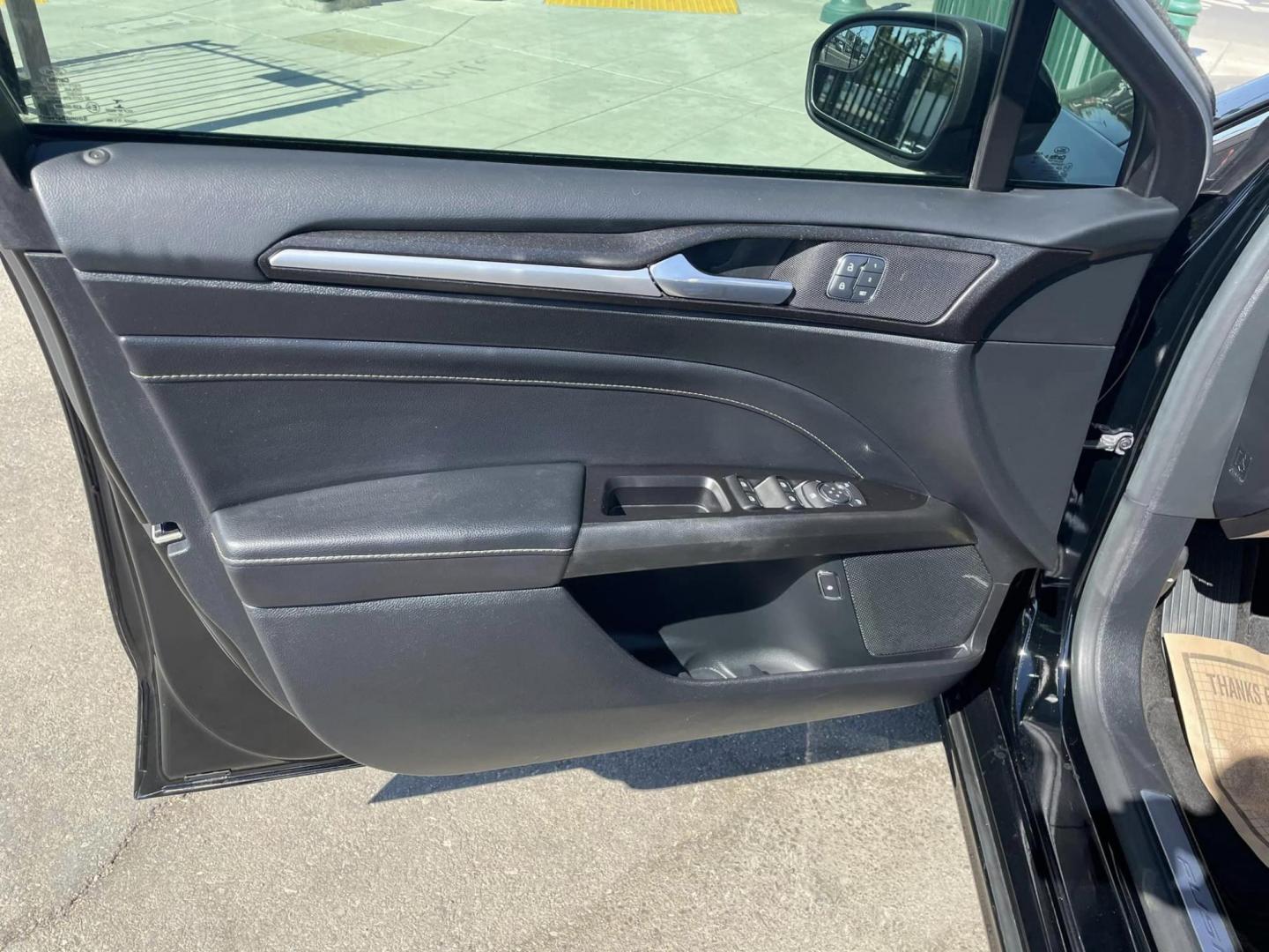 2018 BLACK /BLACK Ford Fusion Energi Titanium (3FA6P0SU1JR) with an 2.0L L4 DOHC 16V HYBRID engine, CVT transmission, located at 744 E Miner Ave, Stockton, CA, 95202, (209) 944-5770, 37.956863, -121.282082 - Photo#5
