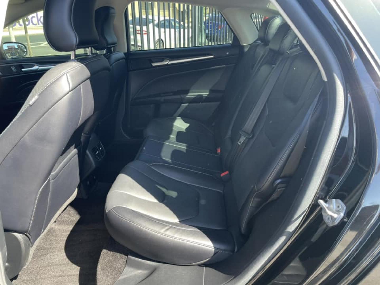 2018 BLACK /BLACK Ford Fusion Energi Titanium (3FA6P0SU1JR) with an 2.0L L4 DOHC 16V HYBRID engine, CVT transmission, located at 744 E Miner Ave, Stockton, CA, 95202, (209) 944-5770, 37.956863, -121.282082 - Photo#10