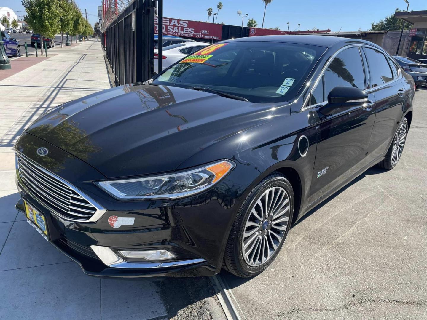 2018 BLACK /BLACK Ford Fusion Energi Titanium (3FA6P0SU1JR) with an 2.0L L4 DOHC 16V HYBRID engine, CVT transmission, located at 744 E Miner Ave, Stockton, CA, 95202, (209) 944-5770, 37.956863, -121.282082 - Photo#3