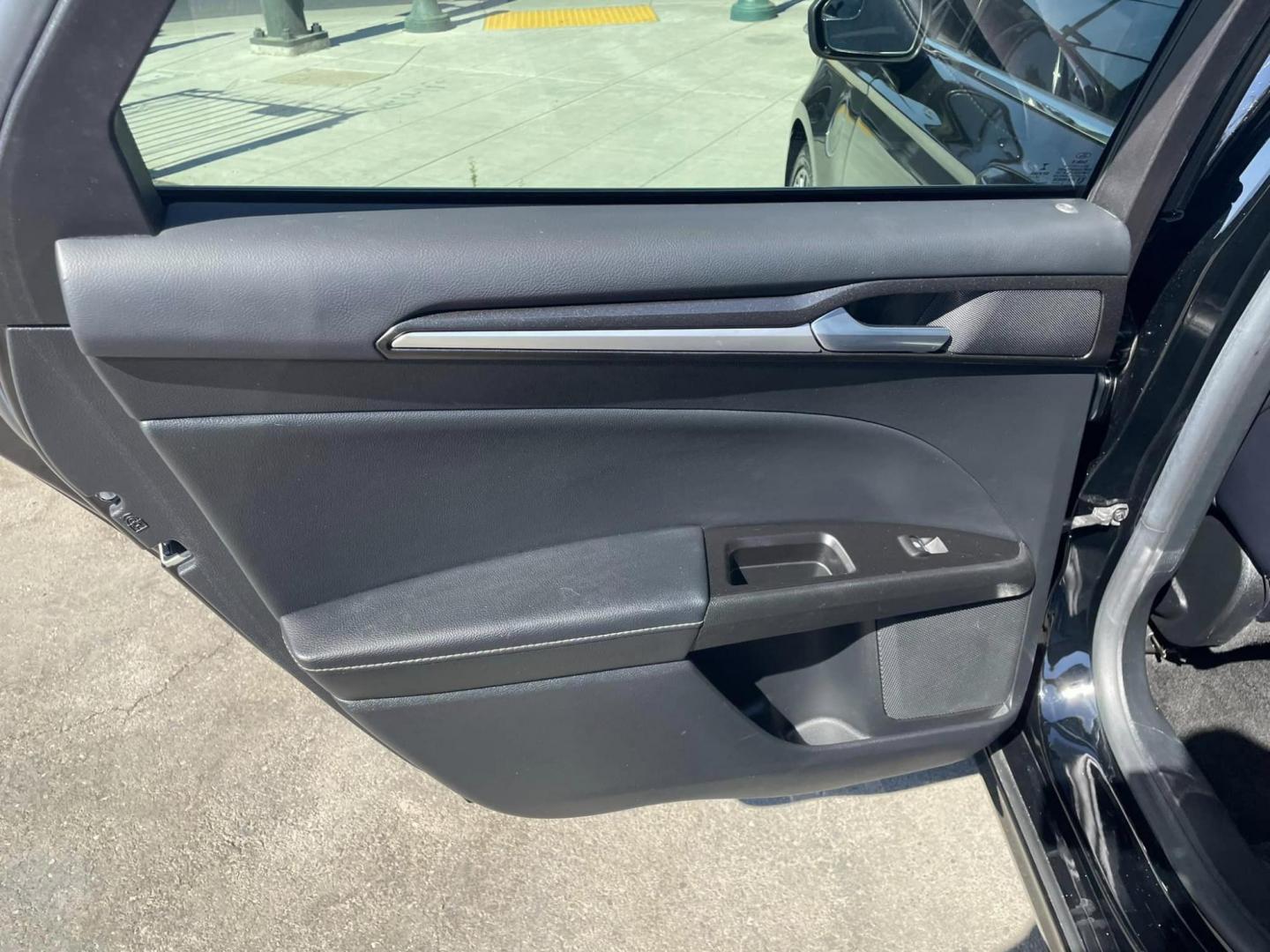 2018 BLACK /BLACK Ford Fusion Energi Titanium (3FA6P0SU1JR) with an 2.0L L4 DOHC 16V HYBRID engine, CVT transmission, located at 744 E Miner Ave, Stockton, CA, 95202, (209) 944-5770, 37.956863, -121.282082 - Photo#9
