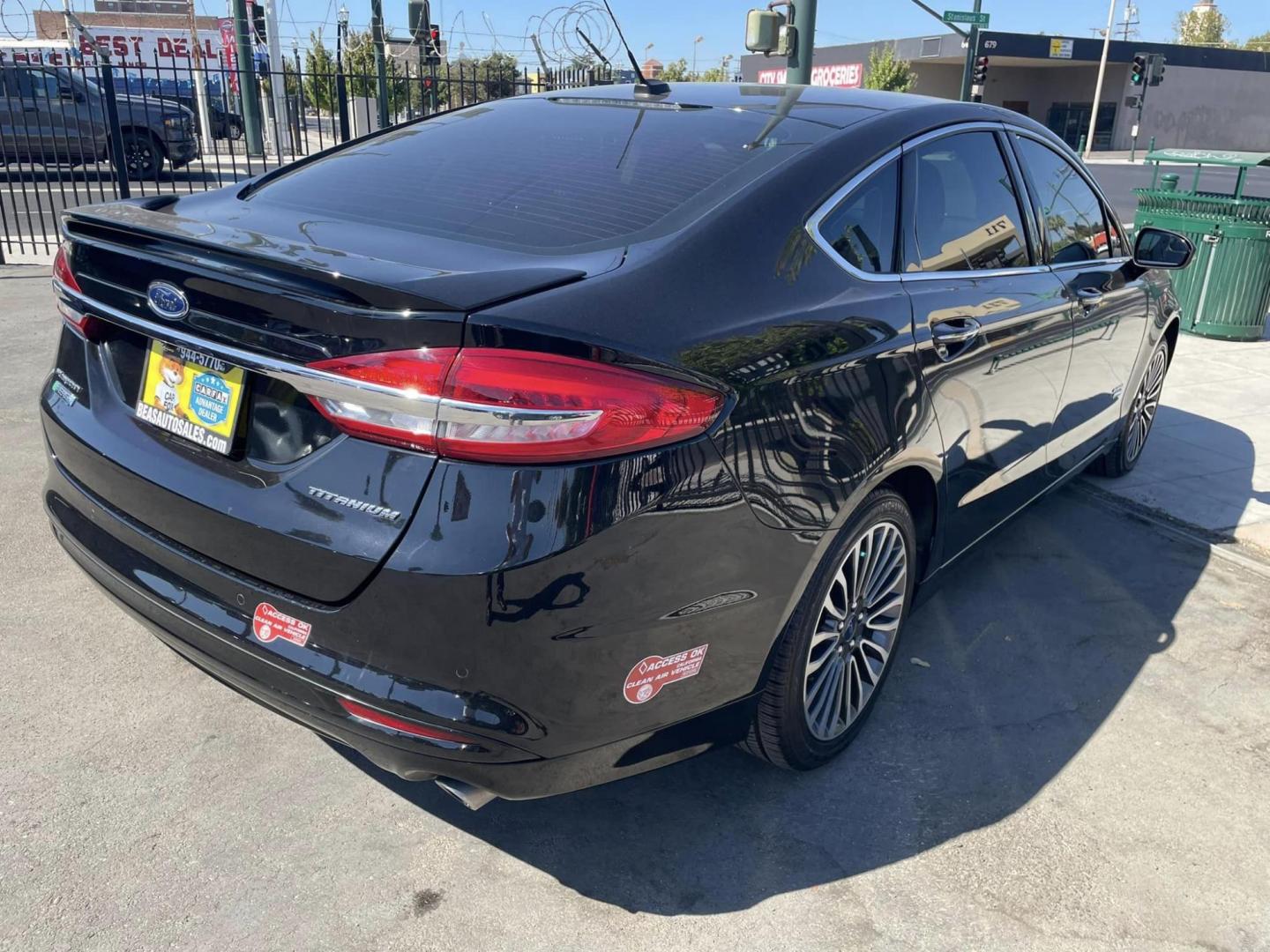 2018 BLACK /BLACK Ford Fusion Energi Titanium (3FA6P0SU1JR) with an 2.0L L4 DOHC 16V HYBRID engine, CVT transmission, located at 744 E Miner Ave, Stockton, CA, 95202, (209) 944-5770, 37.956863, -121.282082 - Photo#15