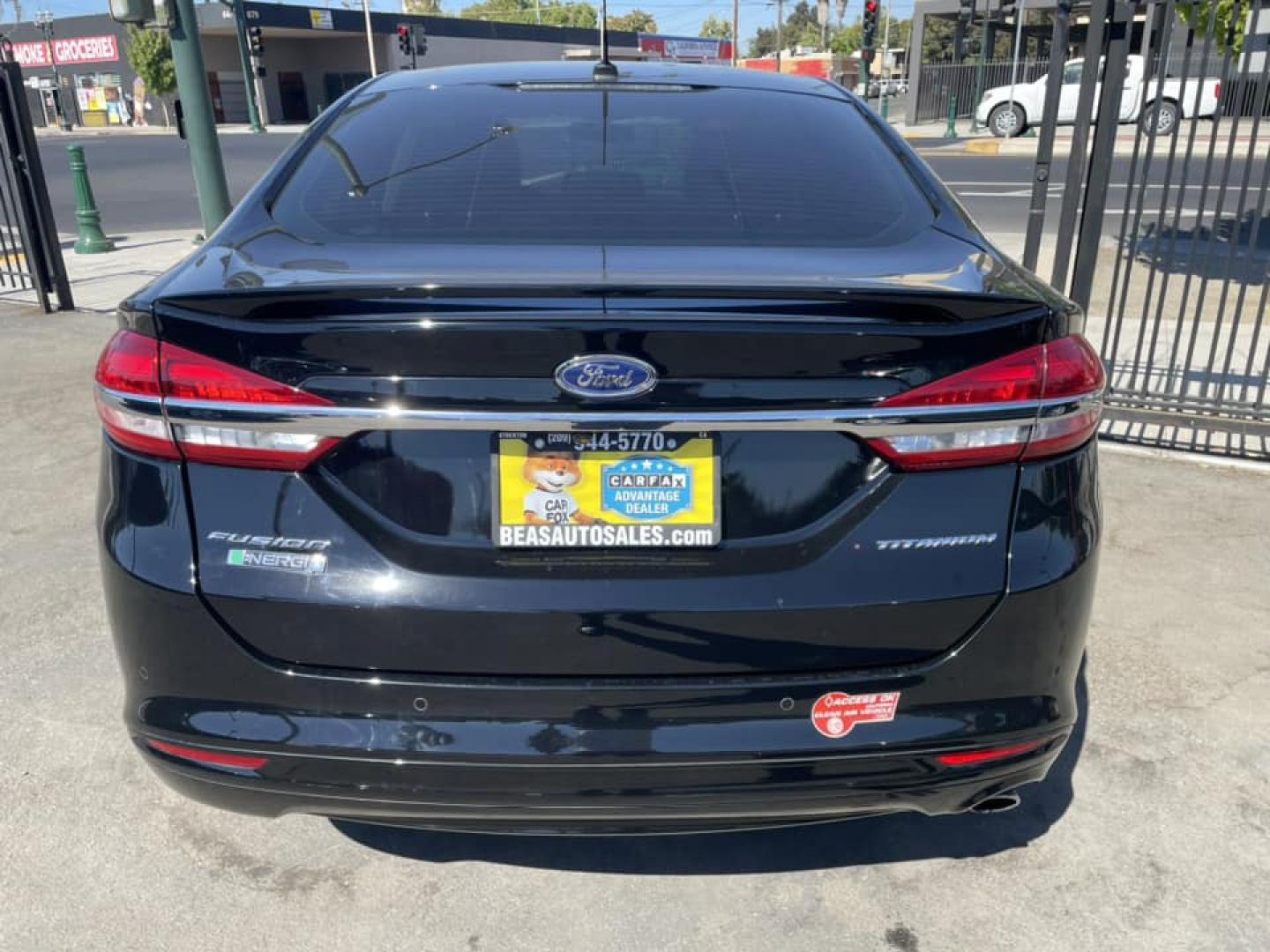 2018 BLACK /BLACK Ford Fusion Energi Titanium (3FA6P0SU1JR) with an 2.0L L4 DOHC 16V HYBRID engine, CVT transmission, located at 744 E Miner Ave, Stockton, CA, 95202, (209) 944-5770, 37.956863, -121.282082 - Photo#14