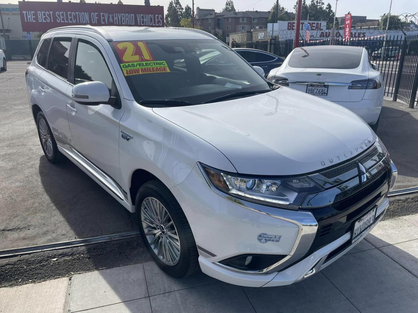 2021 WHITE Mitsubishi Outlander PHEV SEL (JA4J2VA7XMZ) with an 2.0L L4 DOHC 16V HYBRID engine, 1A transmission, located at 744 E Miner Ave, Stockton, CA, 95202, (209) 944-5770, 37.956863, -121.282082 - Photo#1