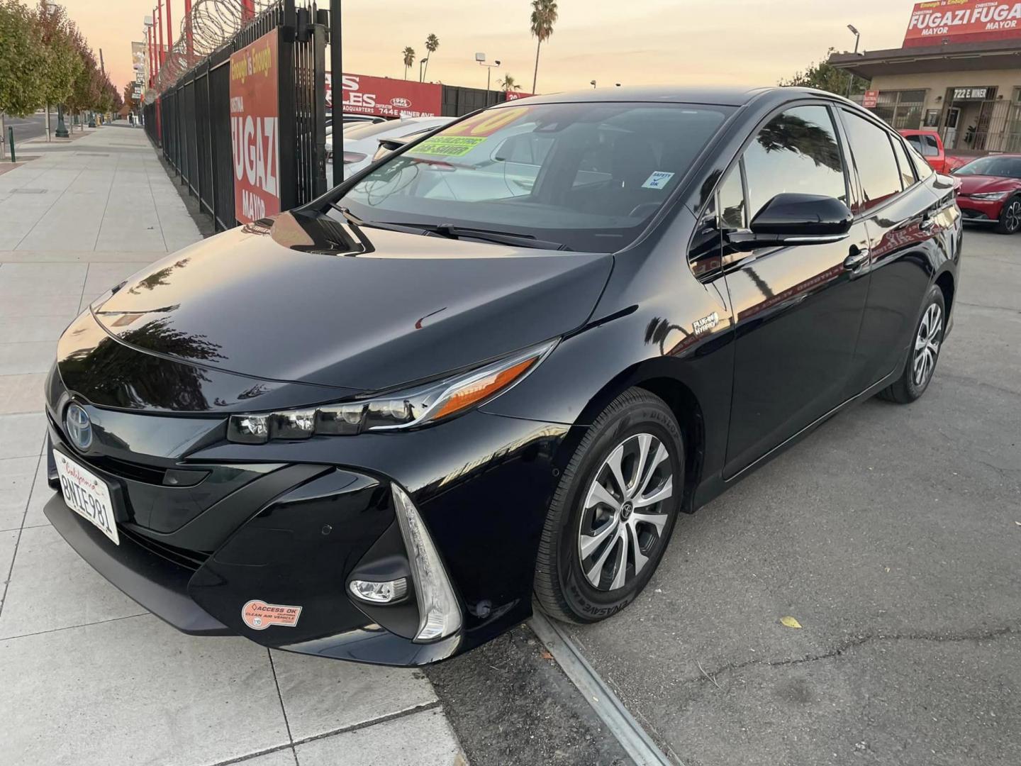2020 RED /BLACK Toyota Prius Prime XLE (JTDKARFP9L3) with an 1.8L L4 DOHC 16V HYBRID engine, CVT transmission, located at 744 E Miner Ave, Stockton, CA, 95202, (209) 944-5770, 37.956863, -121.282082 - Photo#3