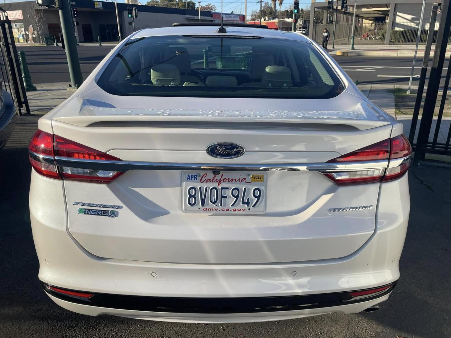 2018 WHITE Ford Fusion Energi Titanium (3FA6P0SUXJR) with an 2.0L L4 DOHC 16V HYBRID engine, CVT transmission, located at 744 E Miner Ave, Stockton, CA, 95202, (209) 944-5770, 37.956863, -121.282082 - PLUS TAXES AND FEEDS - Photo#12