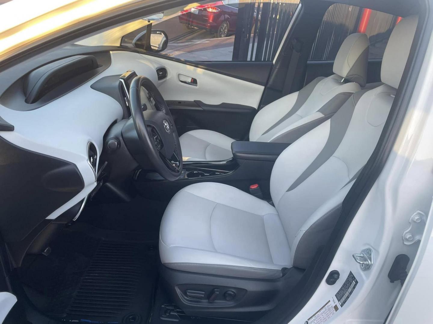 2021 WHITE Toyota Prius Prime LE (JTDKAMFP0M3) with an 1.8L L4 DOHC 16V HYBRID engine, CVT transmission, located at 744 E Miner Ave, Stockton, CA, 95202, (209) 944-5770, 37.956863, -121.282082 - PLUS TAXES AND FEES - Photo#6