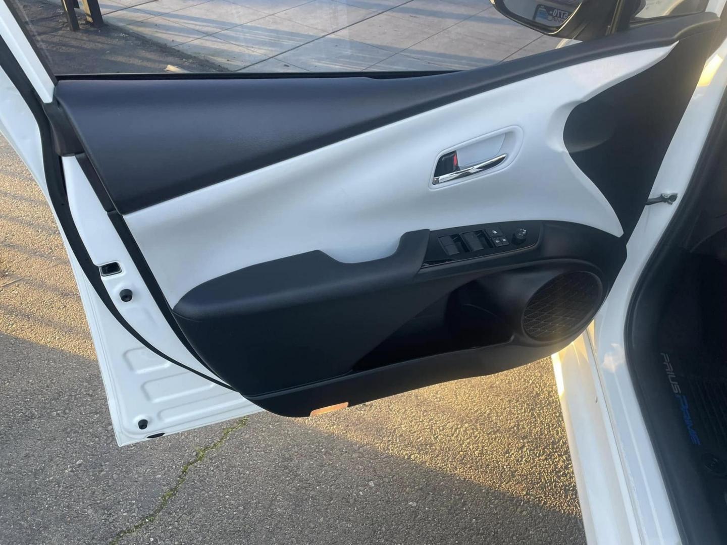 2021 WHITE Toyota Prius Prime LE (JTDKAMFP0M3) with an 1.8L L4 DOHC 16V HYBRID engine, CVT transmission, located at 744 E Miner Ave, Stockton, CA, 95202, (209) 944-5770, 37.956863, -121.282082 - PLUS TAXES AND FEES - Photo#9