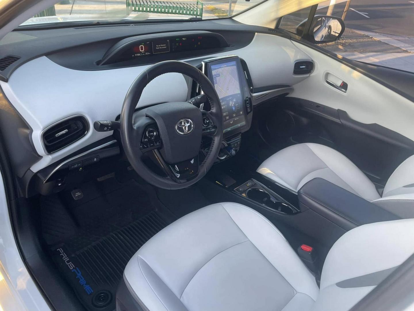 2021 WHITE Toyota Prius Prime LE (JTDKAMFP0M3) with an 1.8L L4 DOHC 16V HYBRID engine, CVT transmission, located at 744 E Miner Ave, Stockton, CA, 95202, (209) 944-5770, 37.956863, -121.282082 - PLUS TAXES AND FEES - Photo#8