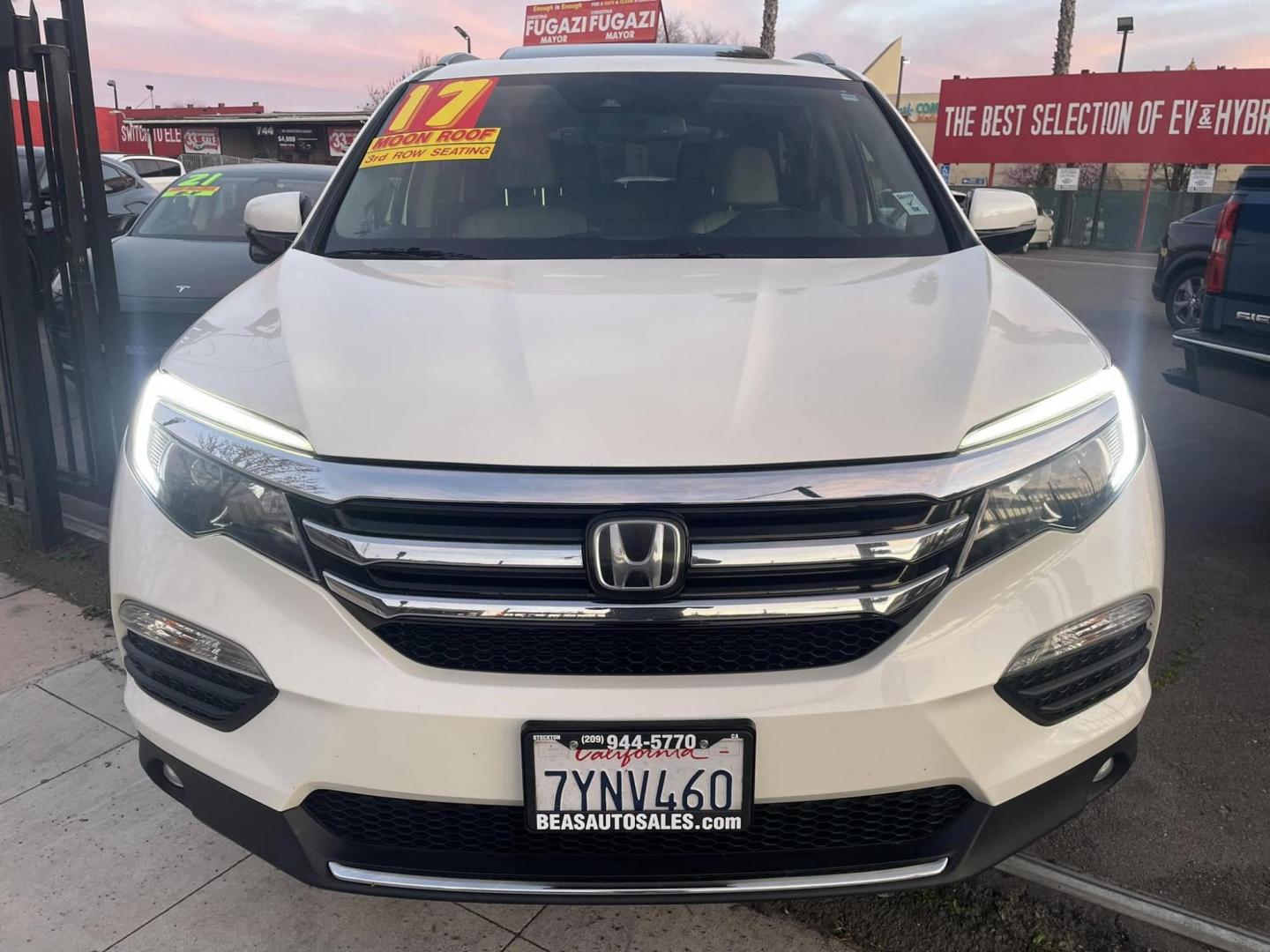 2017 WHITE Honda Pilot Touring 2WD (5FNYF5H97HB) with an 3.5L V6 SOHC 24V engine, 9A transmission, located at 744 E Miner Ave, Stockton, CA, 95202, (209) 944-5770, 37.956863, -121.282082 - Photo#2