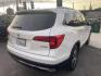 2017 WHITE Honda Pilot Touring 2WD (5FNYF5H97HB) with an 3.5L V6 SOHC 24V engine, 9A transmission, located at 744 E Miner Ave, Stockton, CA, 95202, (209) 944-5770, 37.956863, -121.282082 - Photo#14