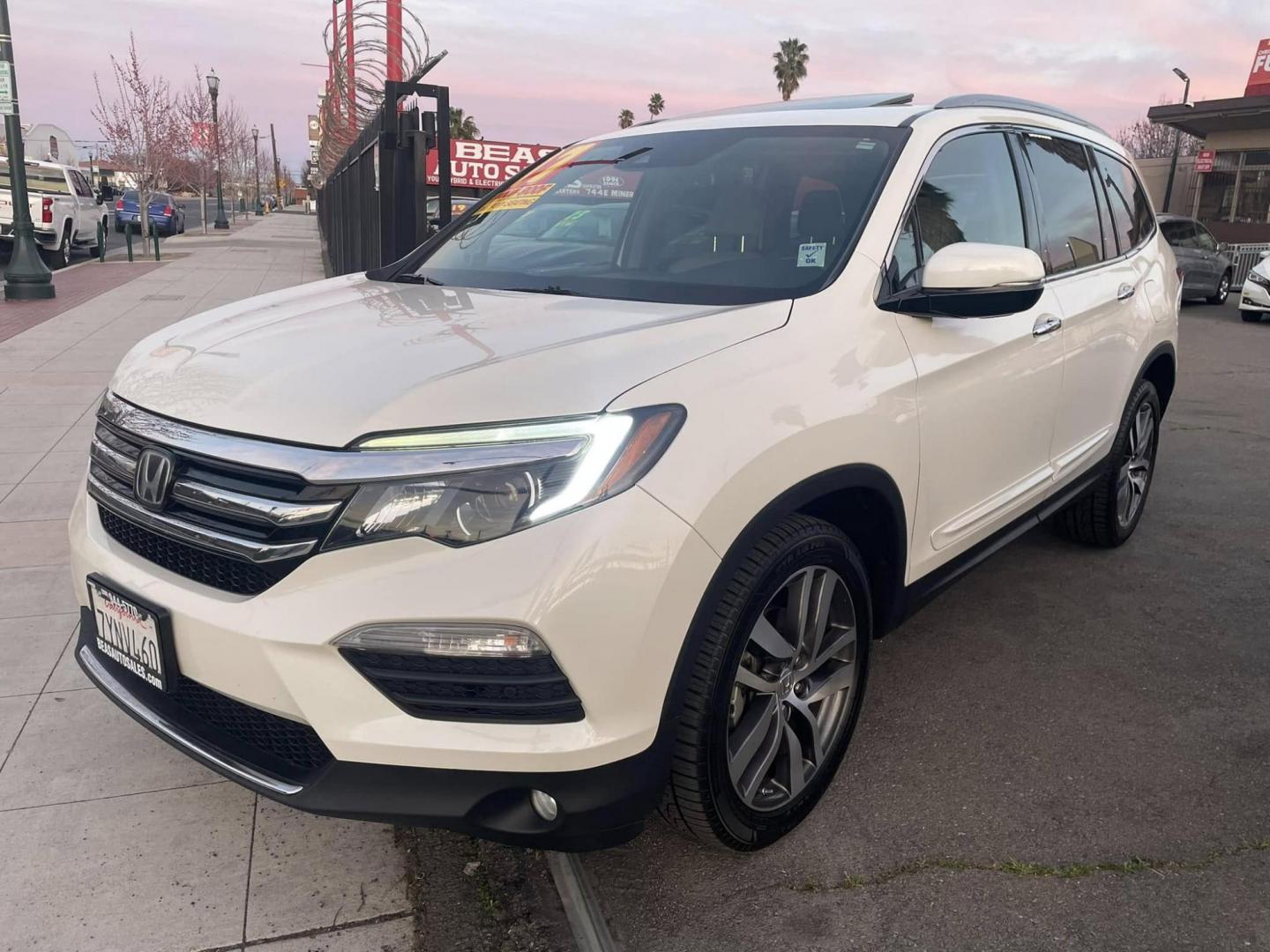 2017 WHITE Honda Pilot Touring 2WD (5FNYF5H97HB) with an 3.5L V6 SOHC 24V engine, 9A transmission, located at 744 E Miner Ave, Stockton, CA, 95202, (209) 944-5770, 37.956863, -121.282082 - Photo#3