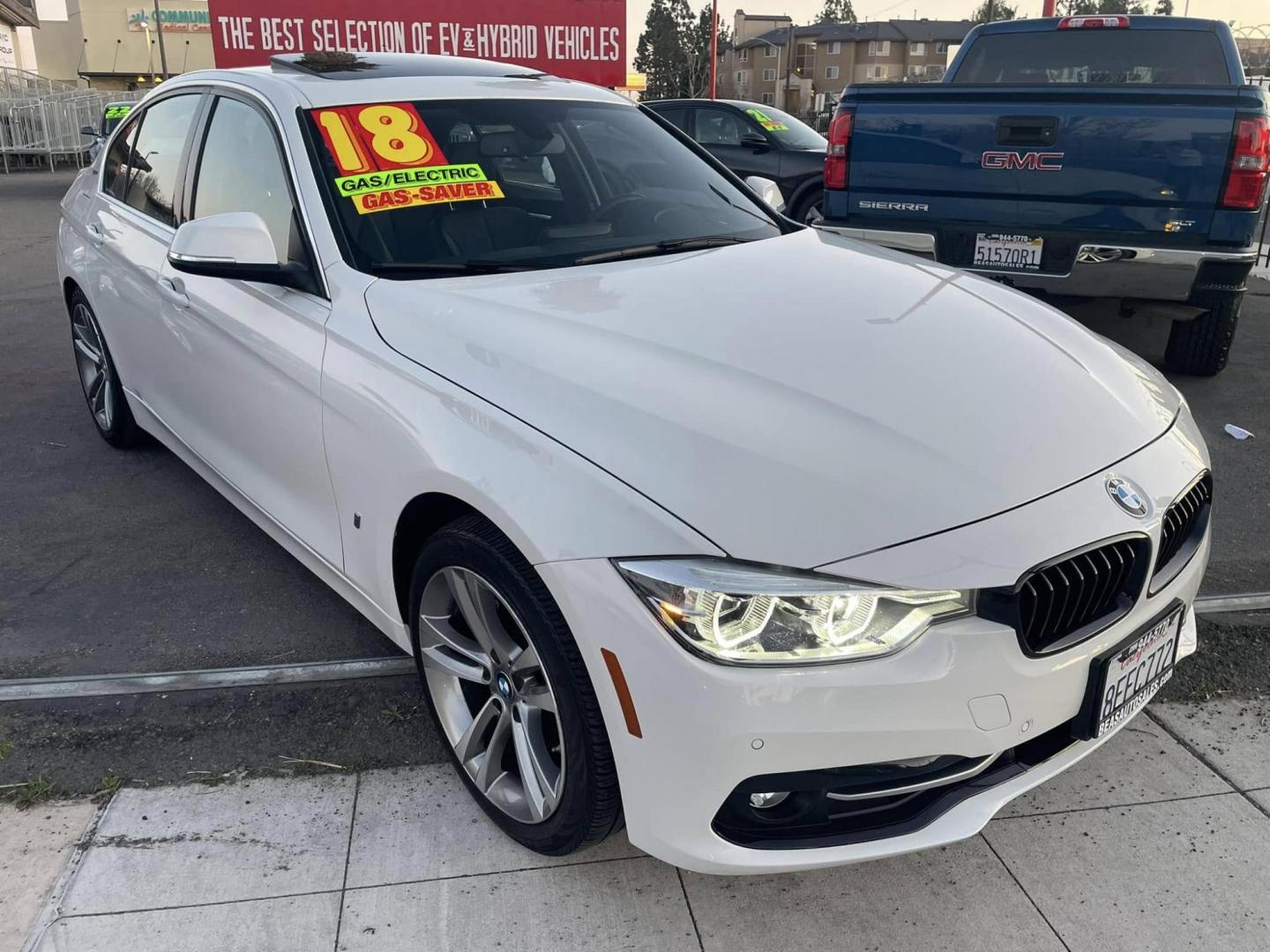 2018 WHITE /WHITE BMW 3-Series 330e iPerformance Sedan (WBA8E1C51JA) with an 2.0L L4 DOHC 16V HYBRID engine, 8A transmission, located at 744 E Miner Ave, Stockton, CA, 95202, (209) 944-5770, 37.956863, -121.282082 - PLUS TAXES AND FEES NO CHARGER AVAILABLE - Photo#0