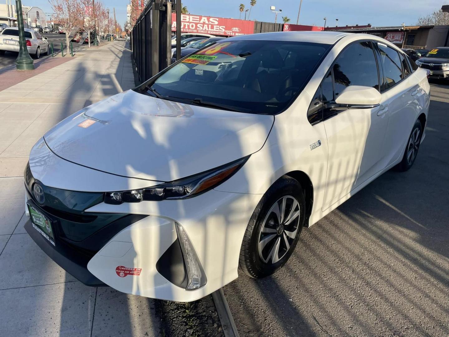 2018 WHITE Toyota Prius Prime Premium (JTDKARFP4J3) with an 1.8L L4 DOHC 16V HYBRID engine, CVT transmission, located at 744 E Miner Ave, Stockton, CA, 95202, (209) 944-5770, 37.956863, -121.282082 - PLUS TAXES AND FEES NO CHAGRER AVAILABLE - Photo#3