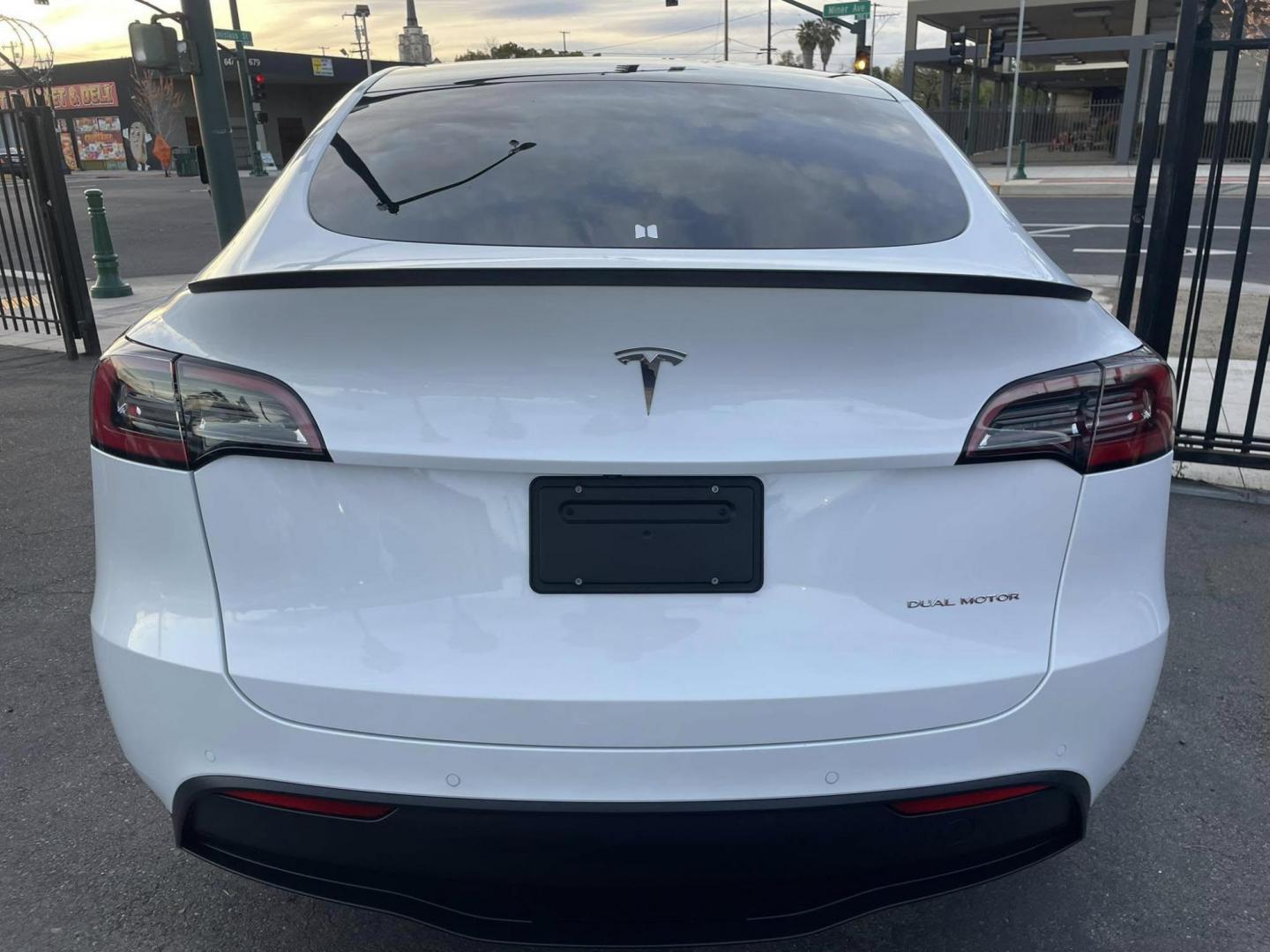 2021 WHITE Tesla Model Y Long Range AWD (5YJYGAEE3MF) with an ELECTRIC engine, 1A transmission, located at 744 E Miner Ave, Stockton, CA, 95202, (209) 944-5770, 37.956863, -121.282082 - Photo#12