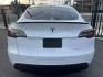 2021 WHITE Tesla Model Y Long Range AWD (5YJYGAEE3MF) with an ELECTRIC engine, 1A transmission, located at 744 E Miner Ave, Stockton, CA, 95202, (209) 944-5770, 37.956863, -121.282082 - Photo#12