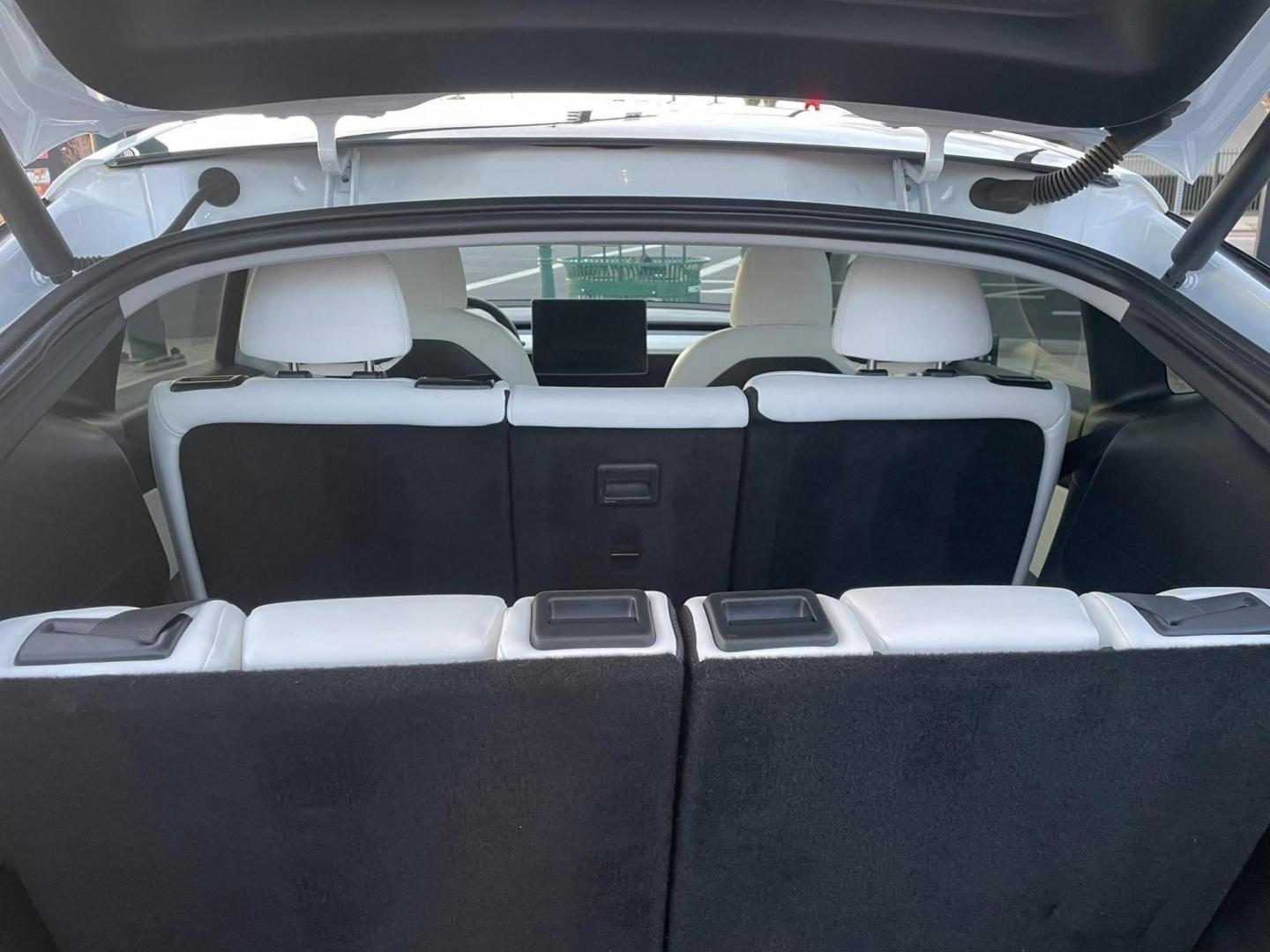 2021 WHITE Tesla Model Y Long Range AWD (5YJYGAEE3MF) with an ELECTRIC engine, 1A transmission, located at 744 E Miner Ave, Stockton, CA, 95202, (209) 944-5770, 37.956863, -121.282082 - Photo#10