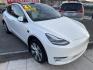 2021 WHITE Tesla Model Y Long Range AWD (5YJYGAEE3MF) with an ELECTRIC engine, 1A transmission, located at 744 E Miner Ave, Stockton, CA, 95202, (209) 944-5770, 37.956863, -121.282082 - Photo#0