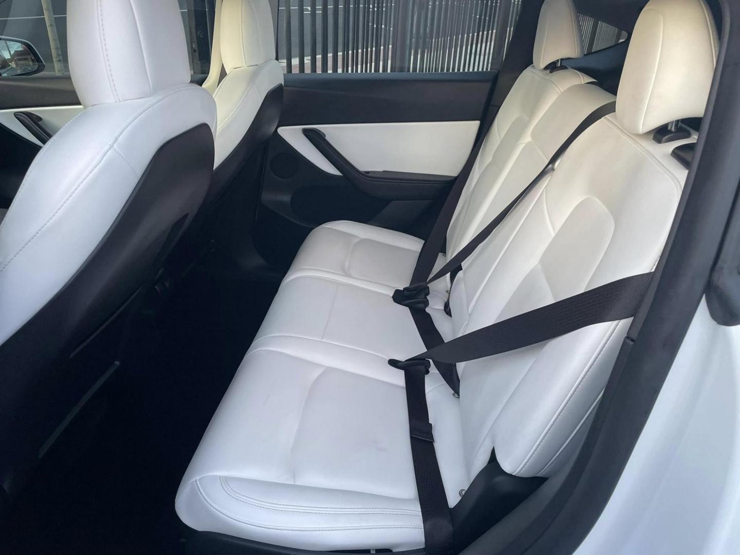 2021 WHITE Tesla Model Y Long Range AWD (5YJYGAEE3MF) with an ELECTRIC engine, 1A transmission, located at 744 E Miner Ave, Stockton, CA, 95202, (209) 944-5770, 37.956863, -121.282082 - Photo#8
