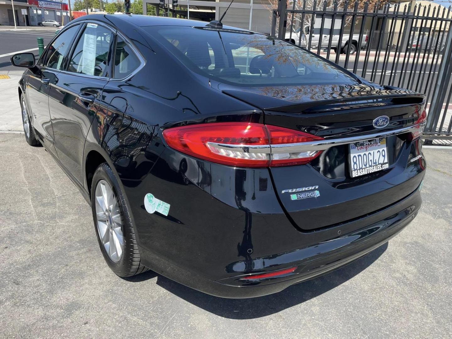 2018 BLACK Ford Fusion Energi Titanium (3FA6P0SU6JR) with an 2.0L L4 DOHC 16V HYBRID engine, CVT transmission, located at 744 E Miner Ave, Stockton, CA, 95202, (209) 944-5770, 37.956863, -121.282082 - PLUS TAXES AND FEES NO CHANGER AVAILBALE - Photo#8