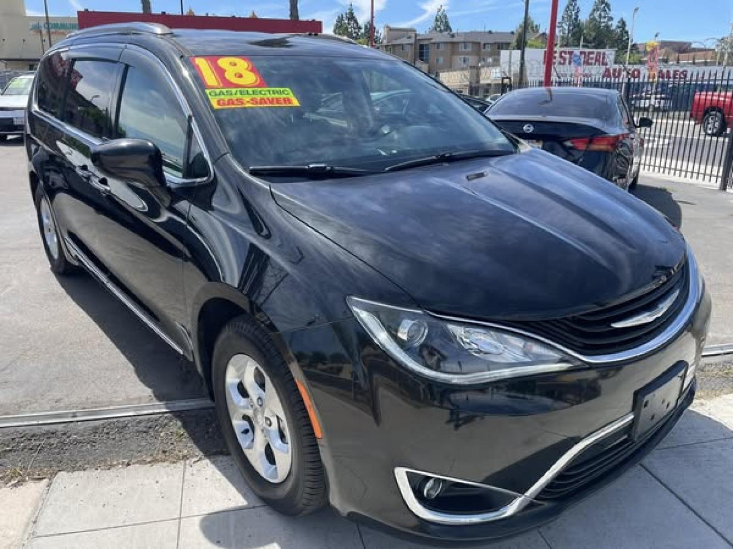 2018 BLACK Chrysler Pacifica Hybrid Touring L (2C4RC1L77JR) with an 3.6L V6 DOHC 24V HYBRID engine, CVT transmission, located at 744 E Miner Ave, Stockton, CA, 95202, (209) 944-5770, 37.956863, -121.282082 - PLUS TAXES AND FEES NO CHARGER AVAILABLE - Photo#0