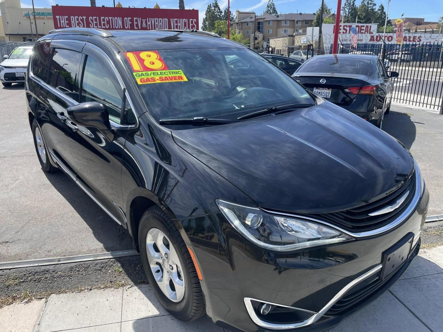 2018 BLACK Chrysler Pacifica Hybrid Touring L (2C4RC1L77JR) with an 3.6L V6 DOHC 24V HYBRID engine, CVT transmission, located at 744 E Miner Ave, Stockton, CA, 95202, (209) 944-5770, 37.956863, -121.282082 - PLUS TAXES AND FEES NO CHARGER AVAILABLE - Photo#1