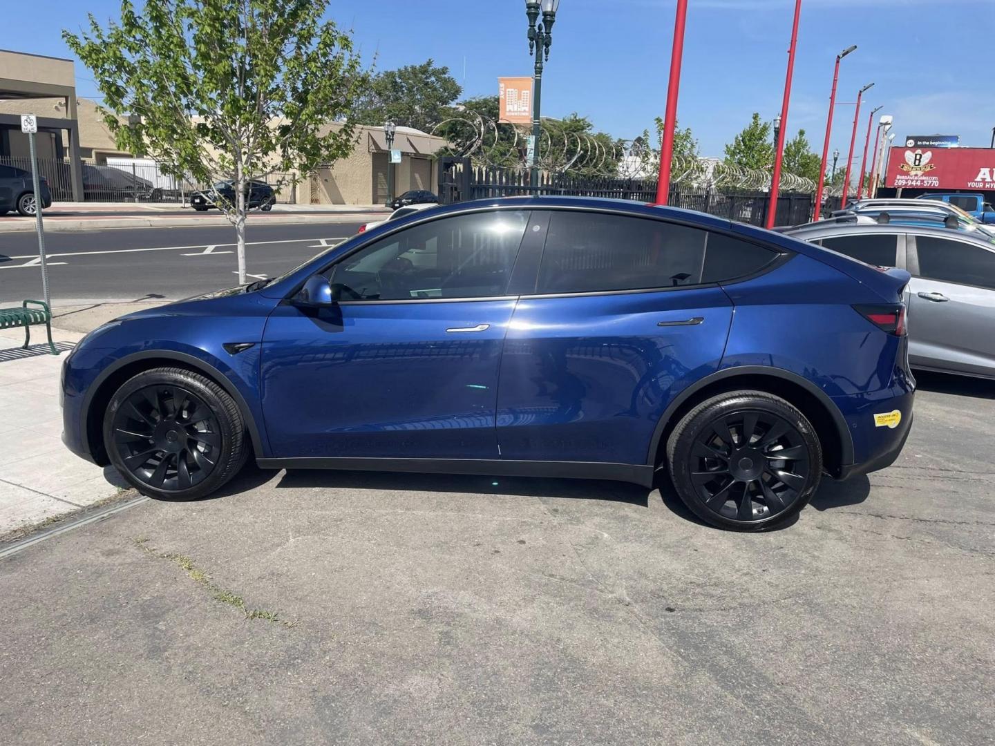 2022 Blue Tesla Model Y Long Range (7SAYGDEE7NF) with an ELECTRIC engine, 1A transmission, located at 744 E Miner Ave, Stockton, CA, 95202, (209) 944-5770, 37.956863, -121.282082 - Photo#3