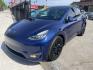 2022 Blue Tesla Model Y Long Range (7SAYGDEE7NF) with an ELECTRIC engine, 1A transmission, located at 744 E Miner Ave, Stockton, CA, 95202, (209) 944-5770, 37.956863, -121.282082 - Photo#2
