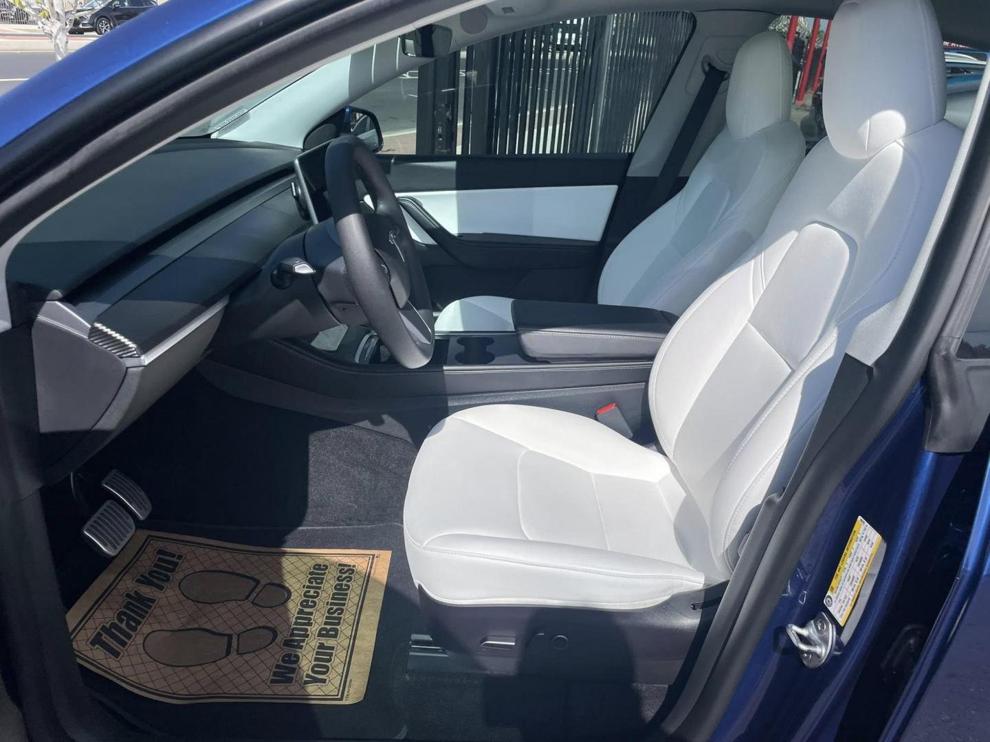 2022 Blue Tesla Model Y Long Range (7SAYGDEE7NF) with an ELECTRIC engine, 1A transmission, located at 744 E Miner Ave, Stockton, CA, 95202, (209) 944-5770, 37.956863, -121.282082 - Photo#5